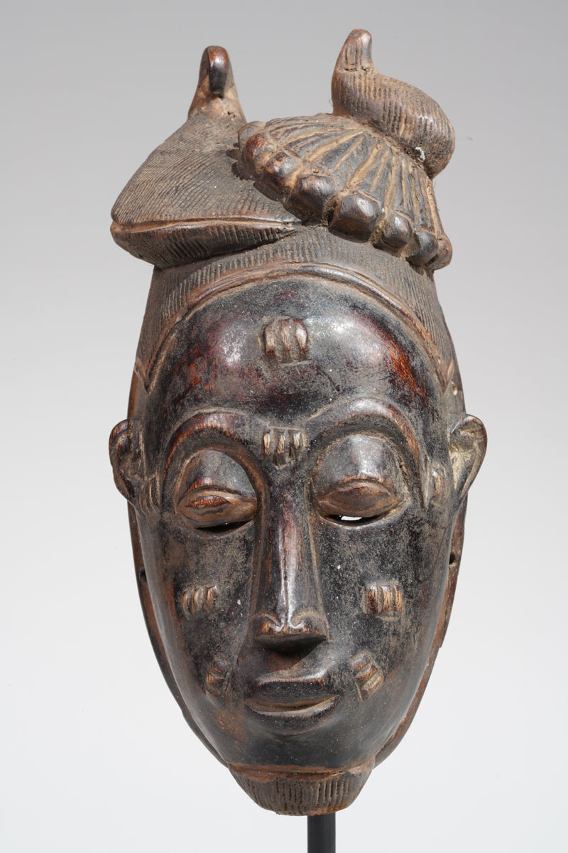 A Baule mask, collected in the Sakassou region