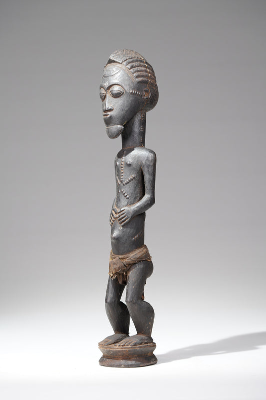 A male Baule sculpture, Cote d'Ivoire, collected in the Sakassou region