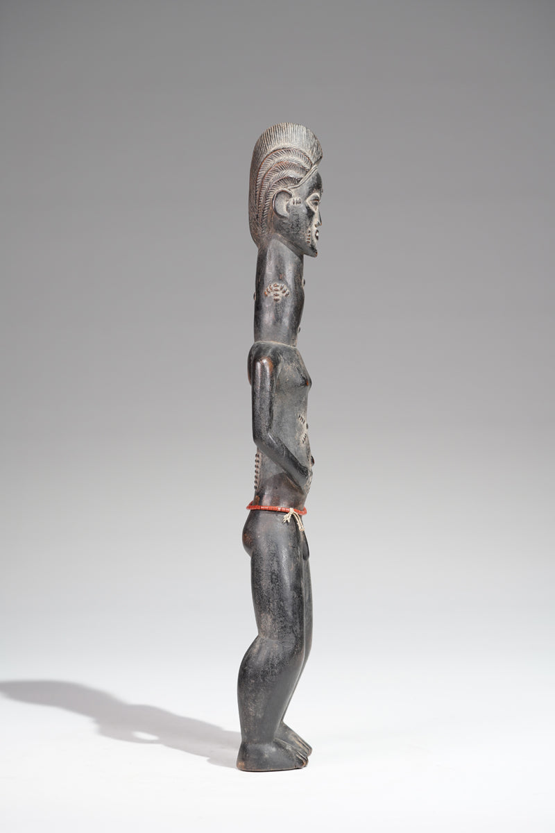 A male Baule sculpture from the Beomi region