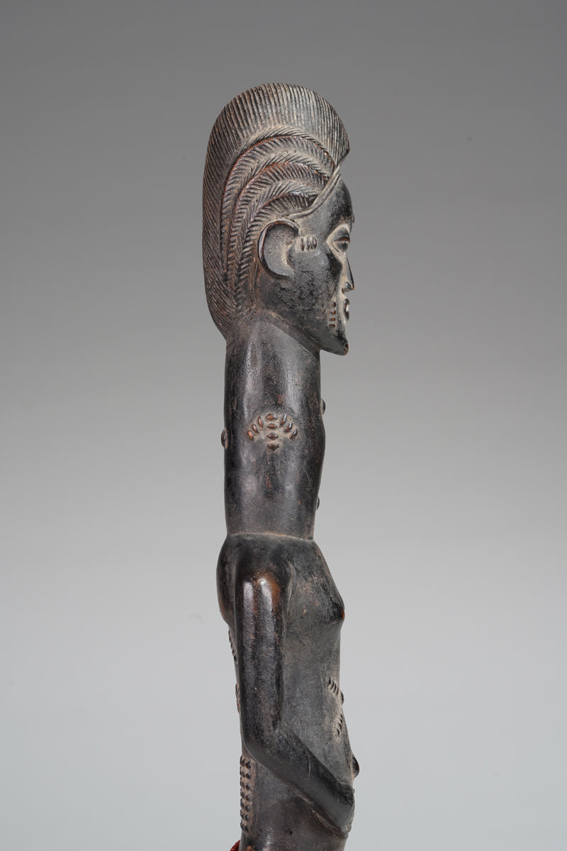 A male Baule sculpture from the Beomi region