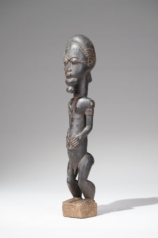 A male Baule sculpture from the Sakassou region