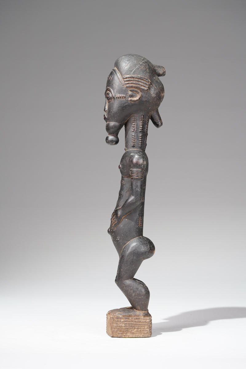 A male Baule sculpture from the Sakassou region