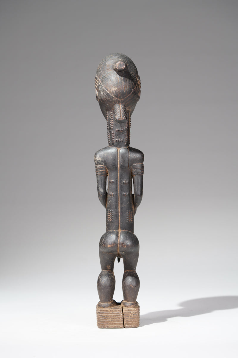 A male Baule sculpture from the Sakassou region