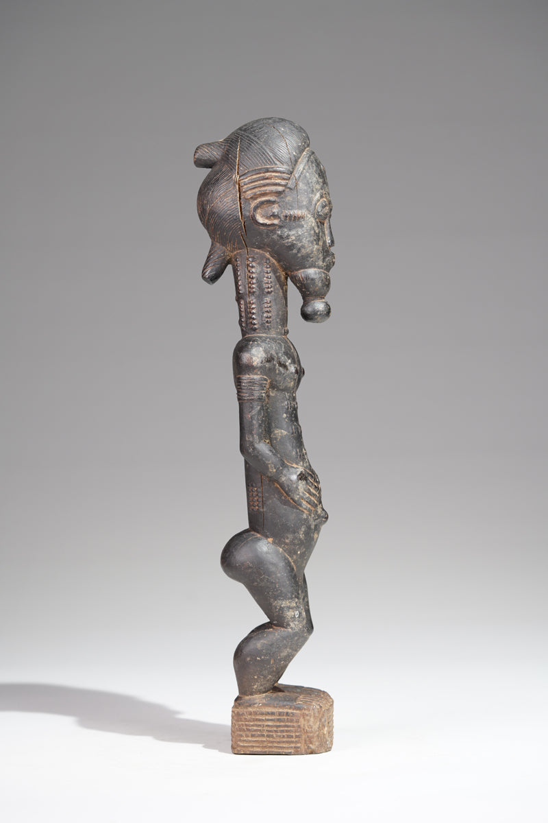 A male Baule sculpture from the Sakassou region