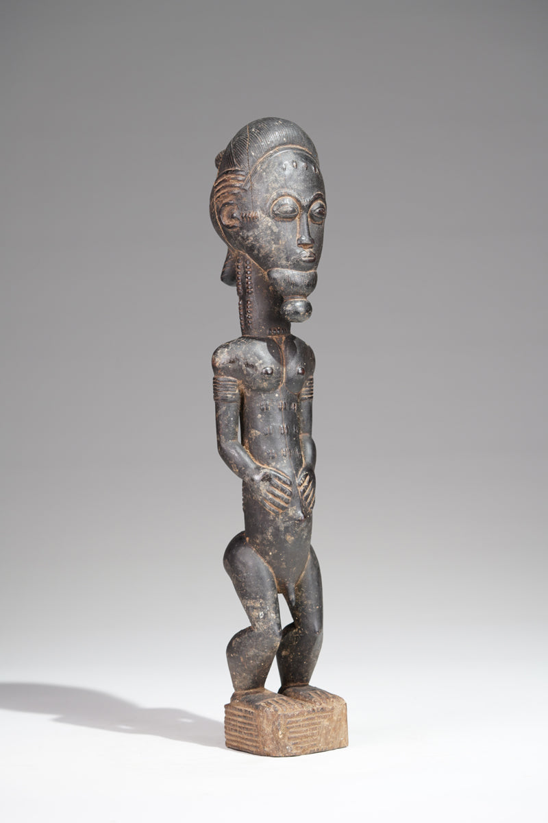 A male Baule sculpture from the Sakassou region