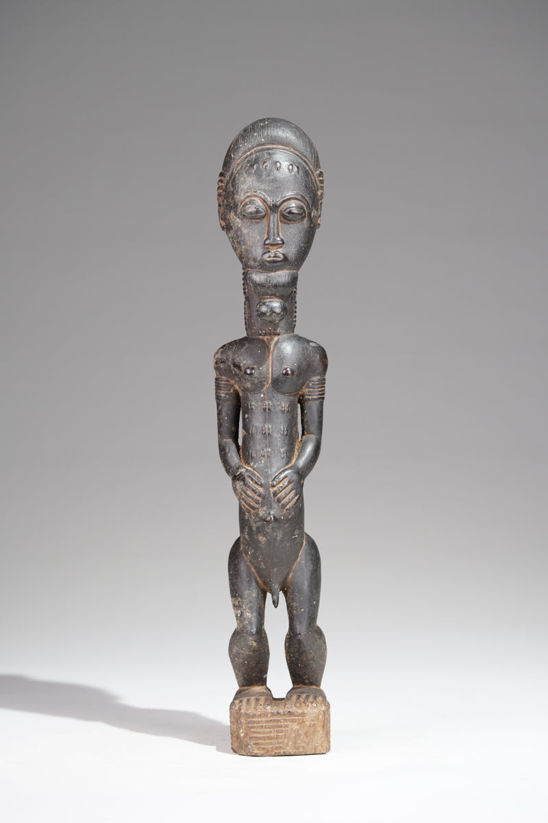 A male Baule sculpture from the Sakassou region