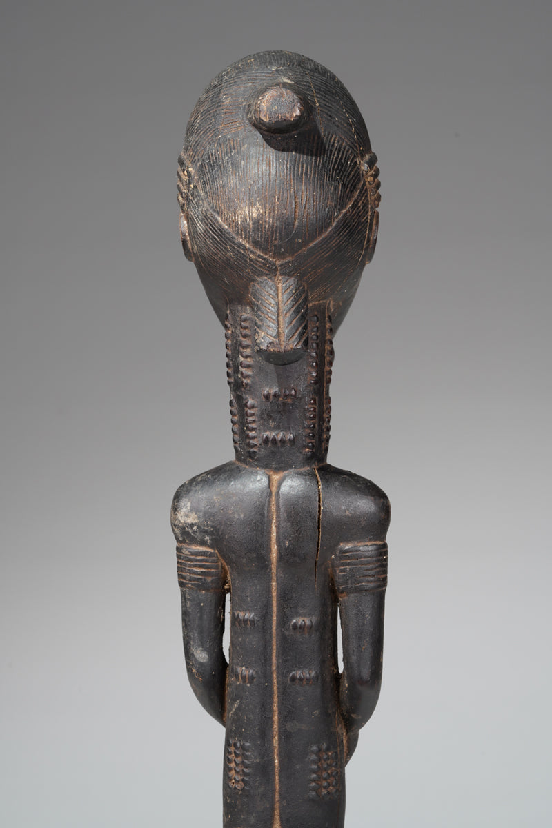 A male Baule sculpture from the Sakassou region