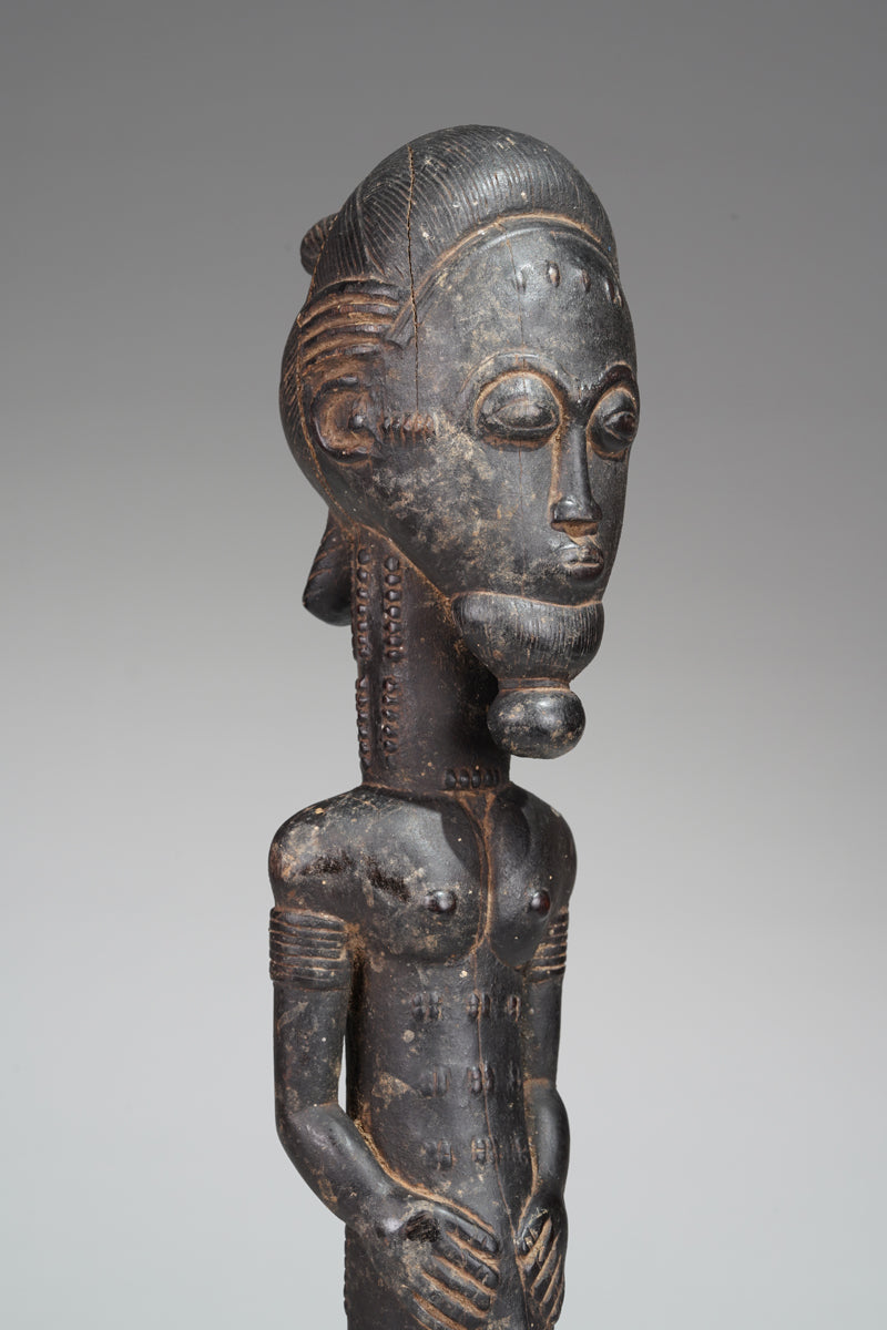 A male Baule sculpture from the Sakassou region