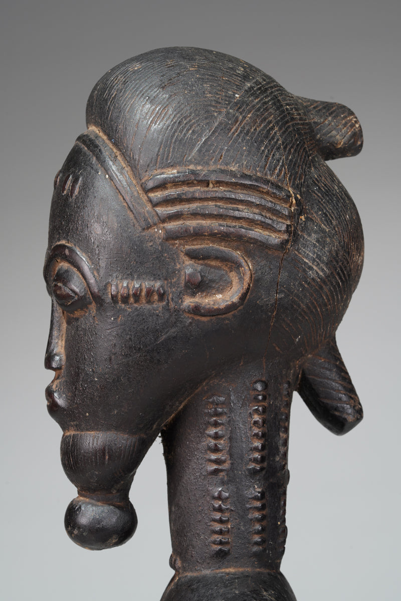 A male Baule sculpture from the Sakassou region