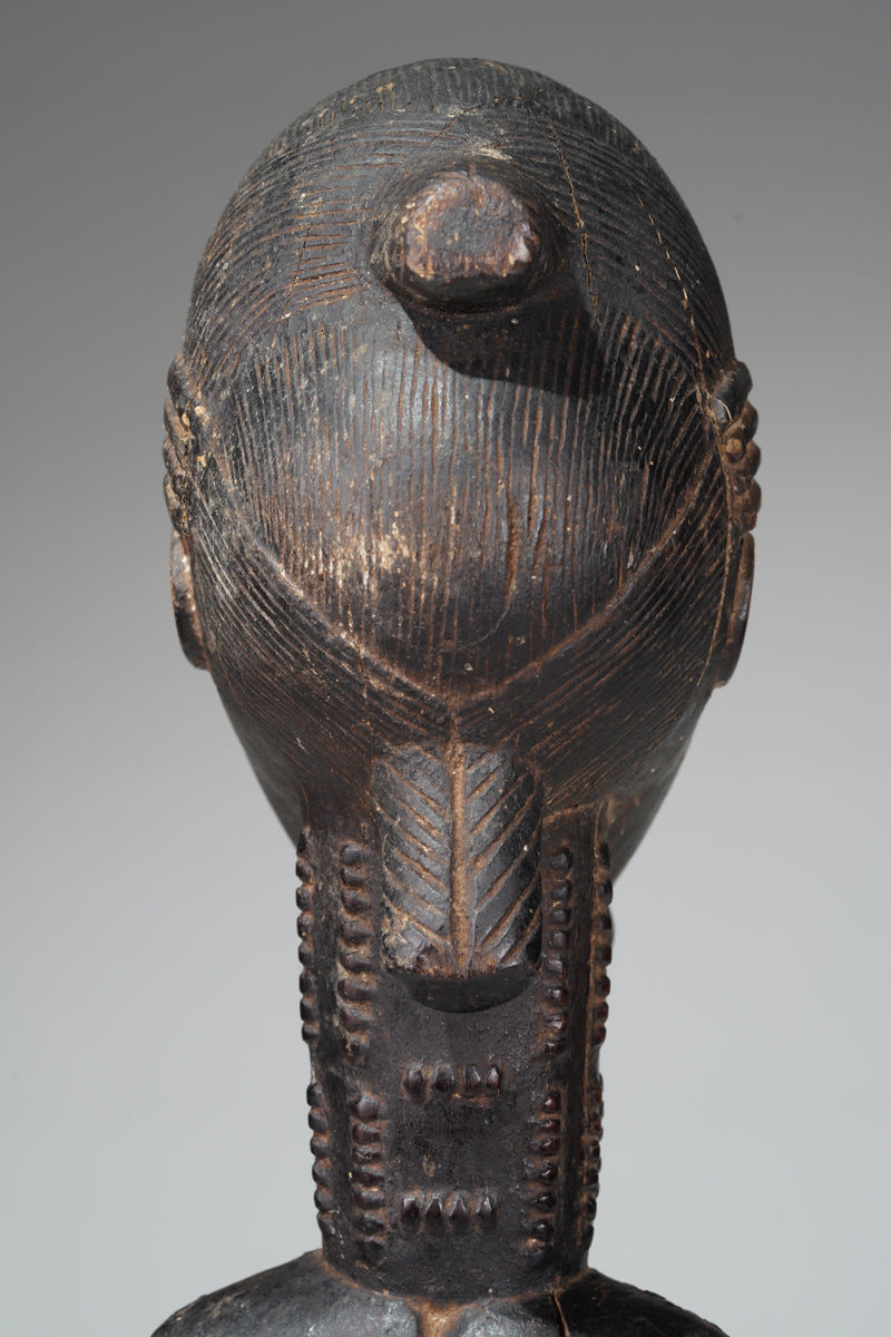 A male Baule sculpture from the Sakassou region