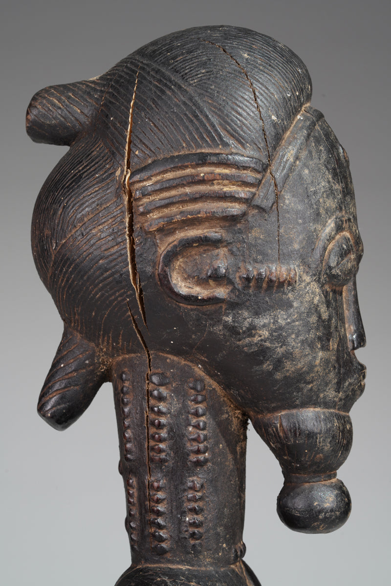 A male Baule sculpture from the Sakassou region