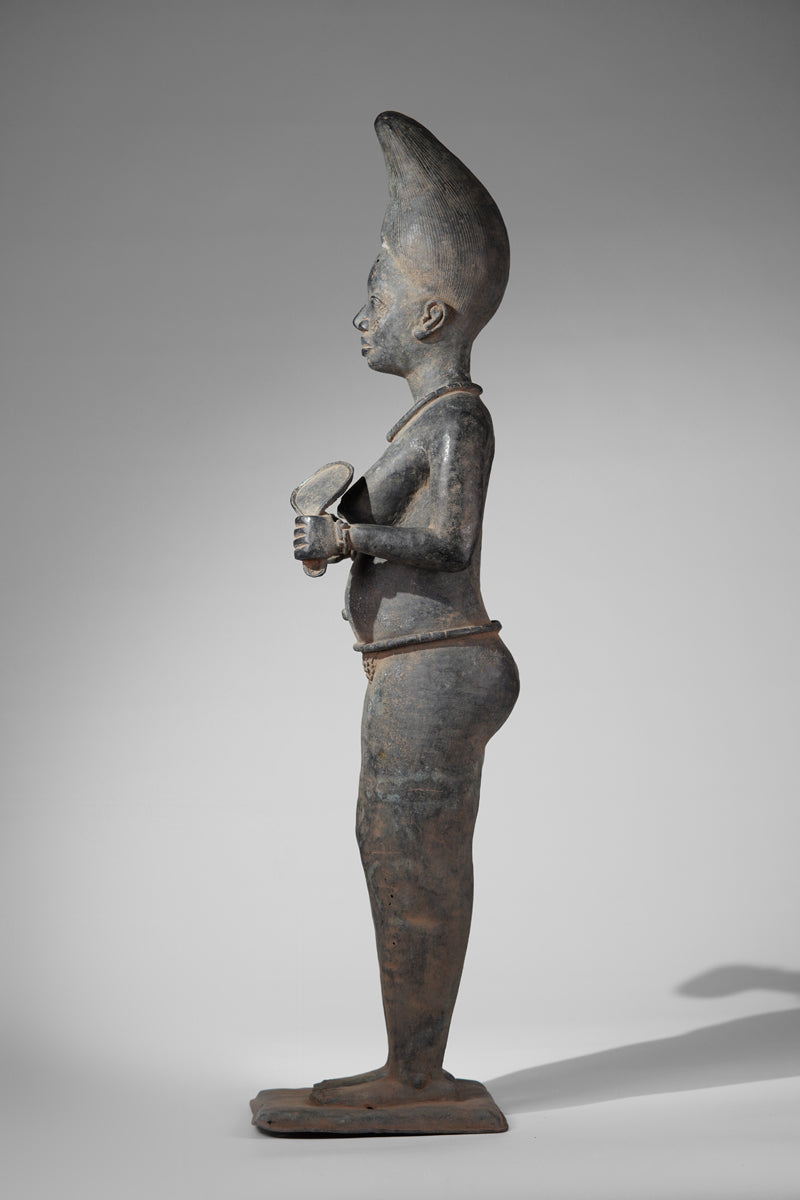 A female bronze sculptures in the style of Tada.