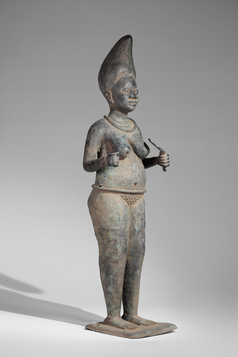 A female bronze sculptures in the style of Tada.