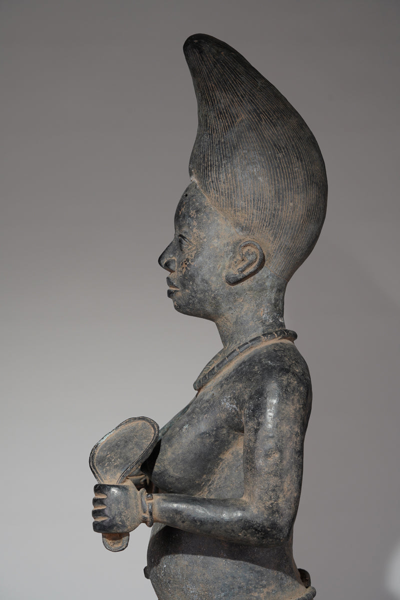 A female bronze sculptures in the style of Tada.