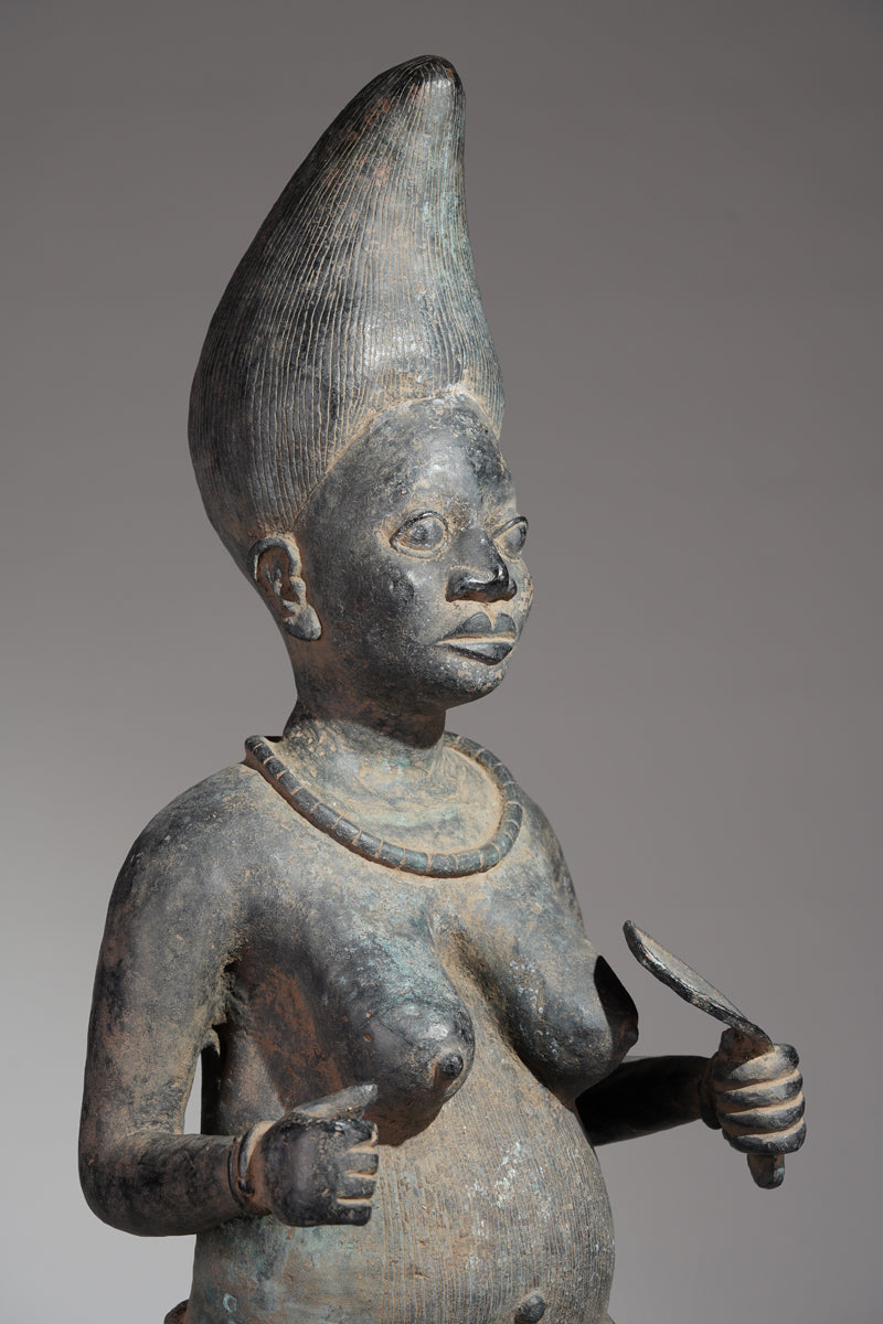 A female bronze sculptures in the style of Tada.