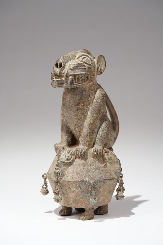 An Uzokpo (lidded bowls) bronze leopard container