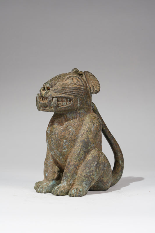 A seated bronze leopard, in the style of Benin