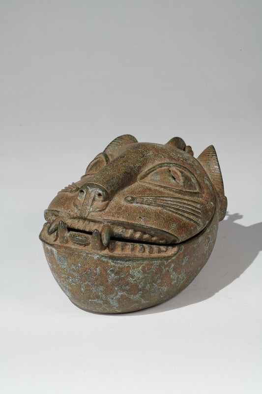 An Uzokpo (lidded bowls) bronze leopard container