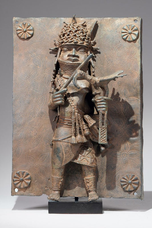 A brass plate probably depicting Oba Esigie in the style of Benin