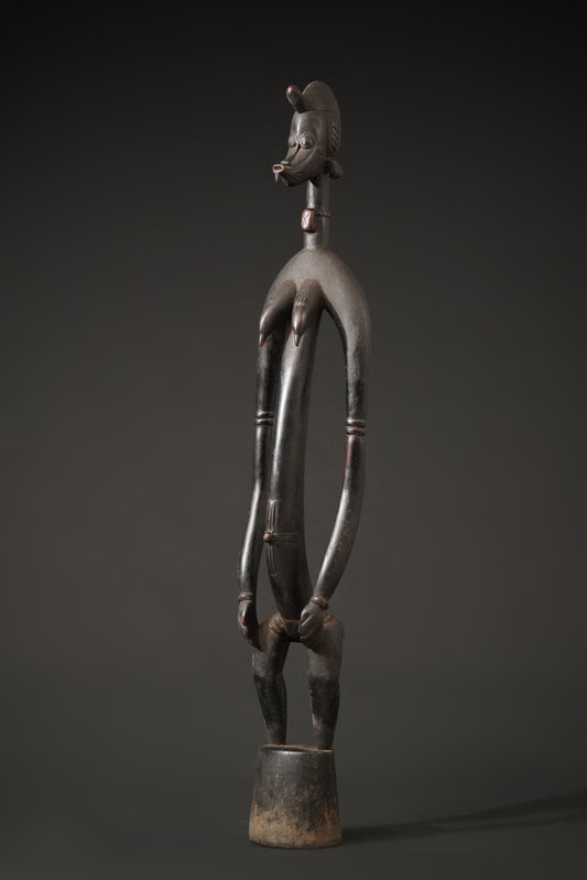 A female Senufo Rhythm Pounder