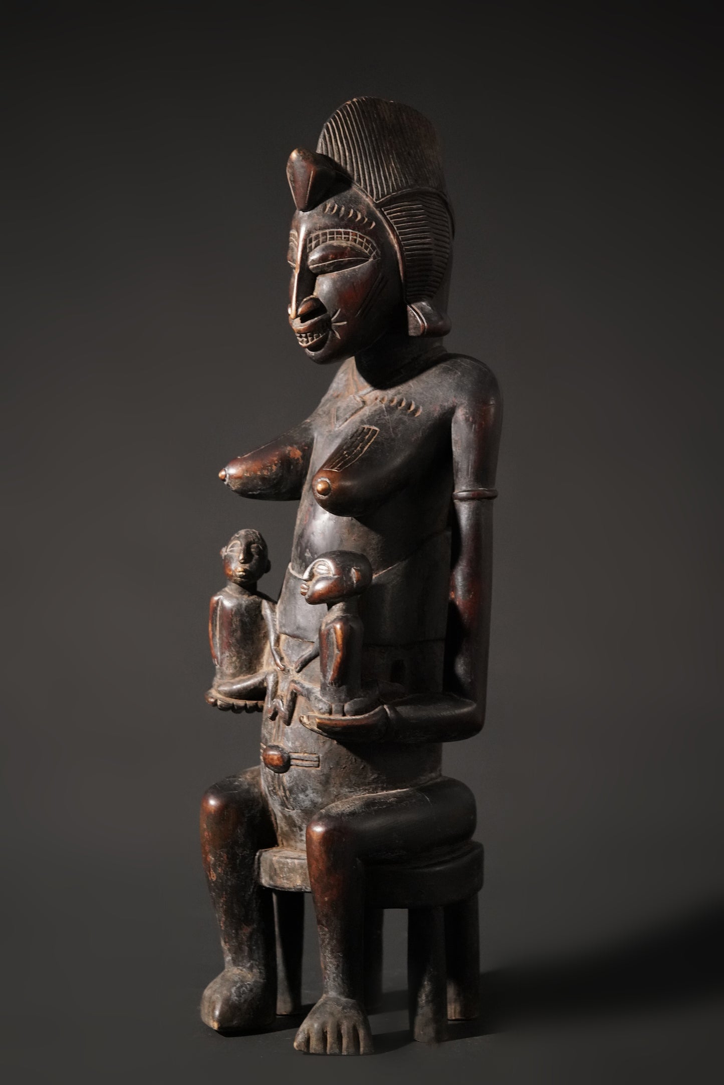 A remarkable seated Senufo maternity