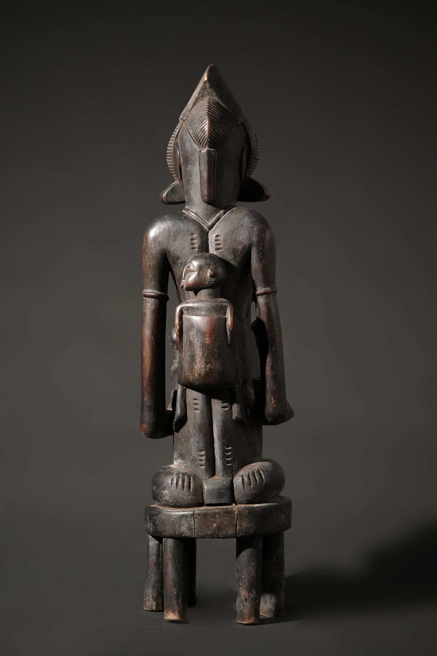 A remarkable seated Senufo maternity