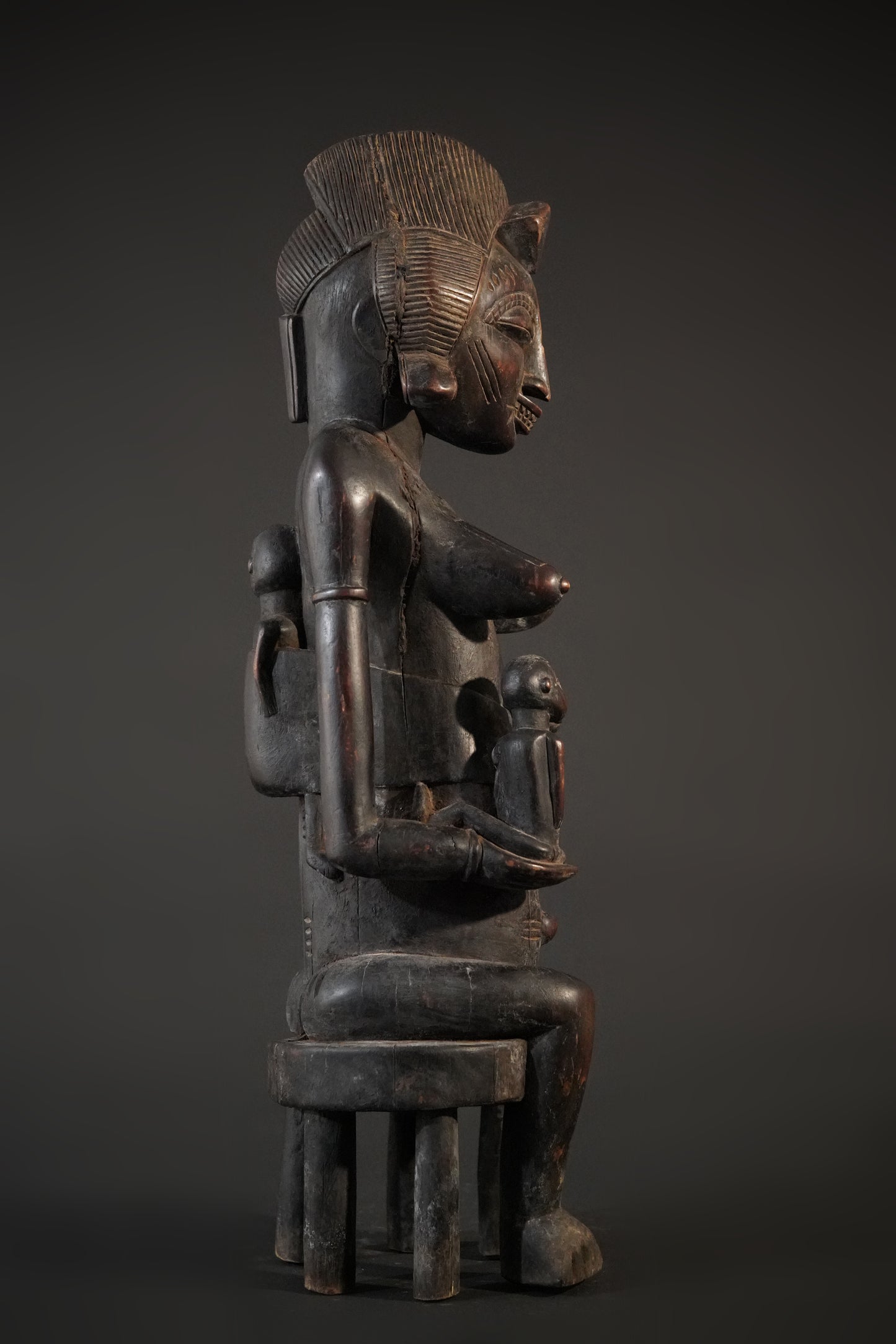 A remarkable seated Senufo maternity