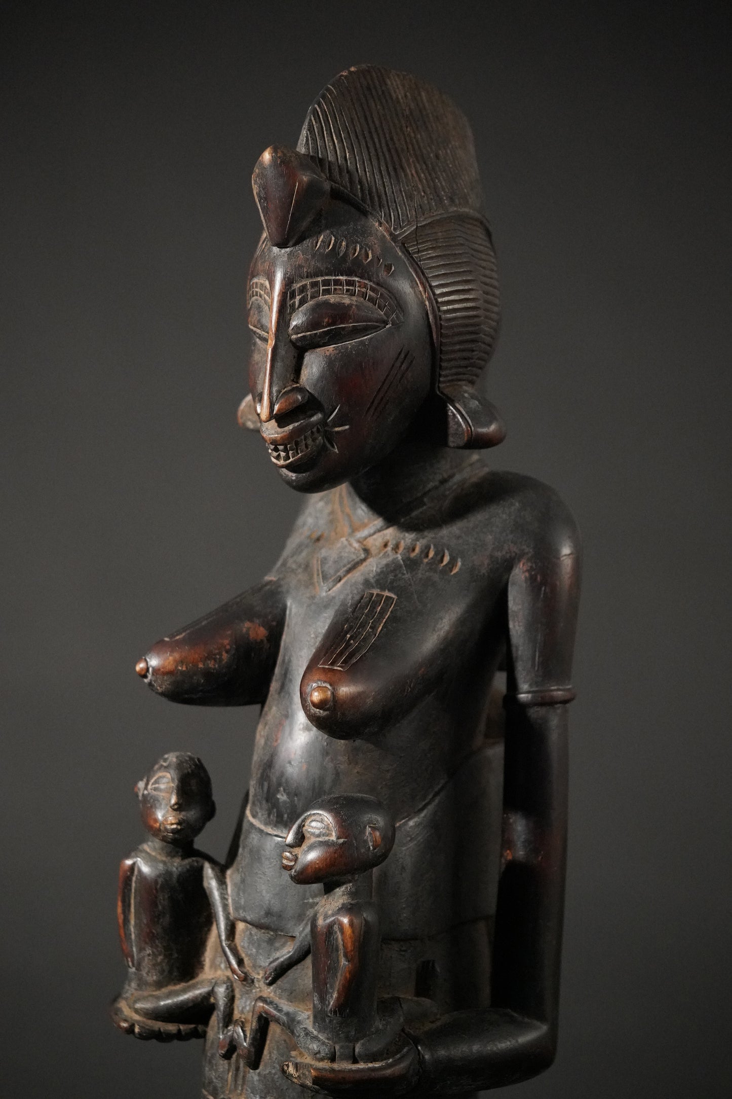 A remarkable seated Senufo maternity