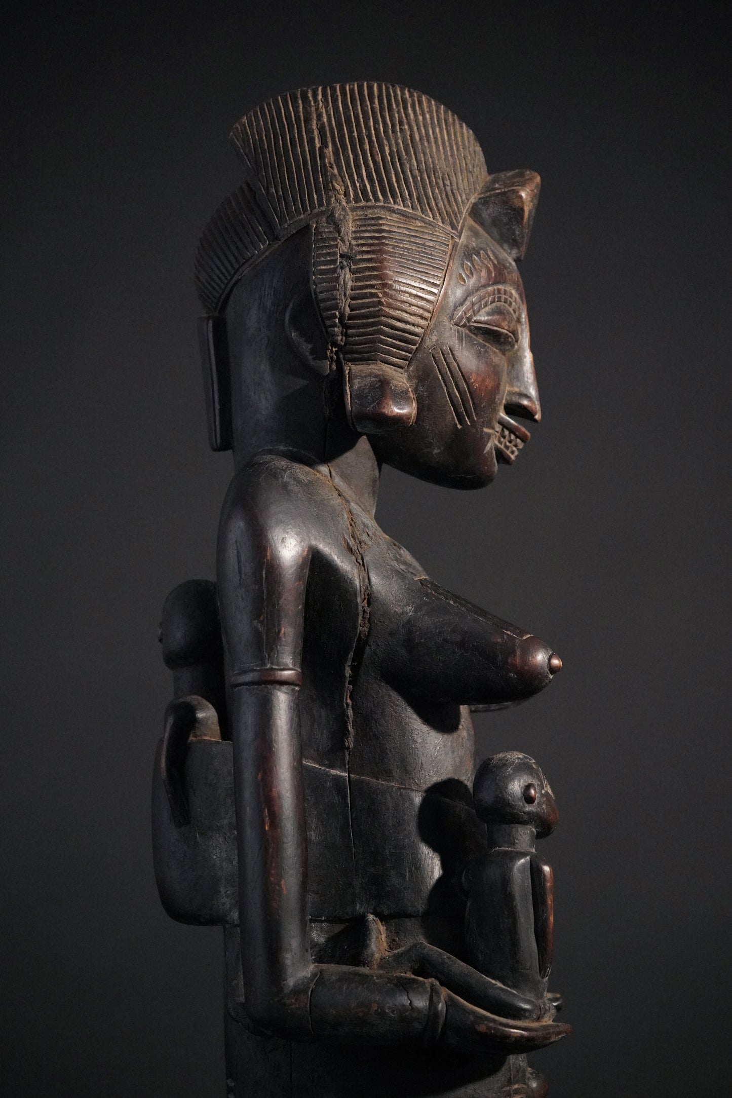 A remarkable seated Senufo maternity