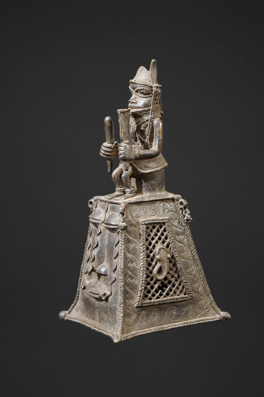 A bronze bell in the style of Benin