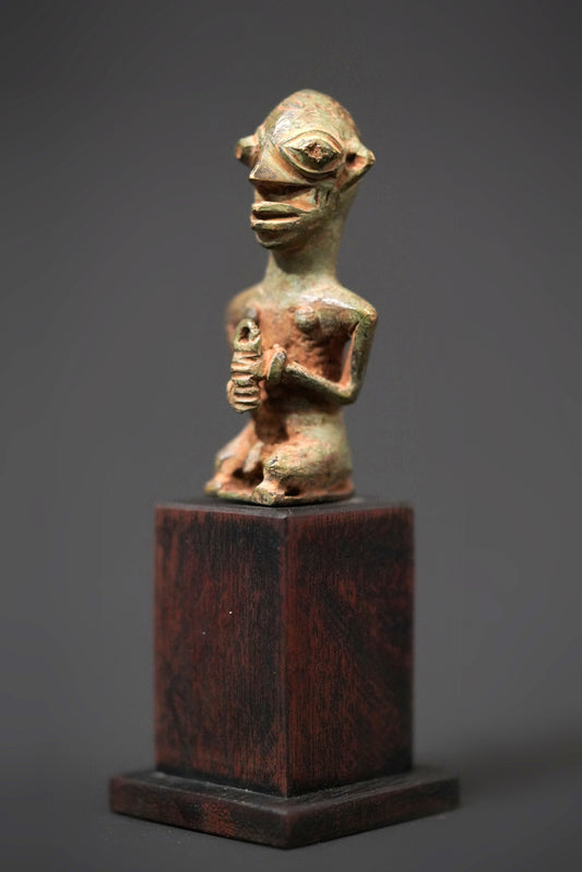 A male Yoruba metal sculpture