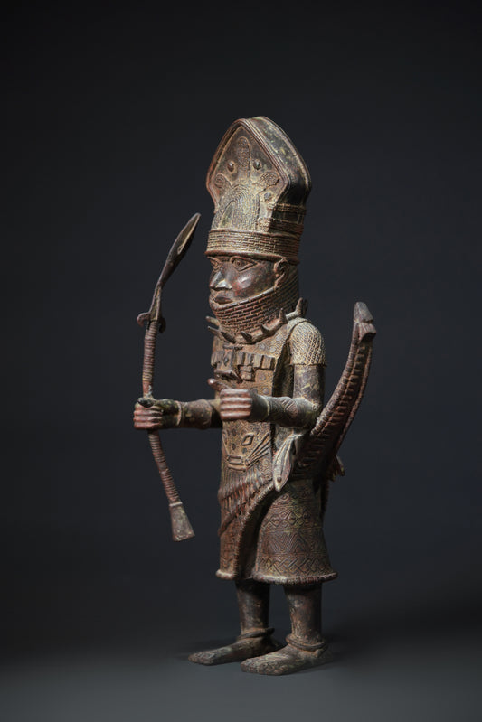 A Dignitary, brass, lost mould casting, Benin