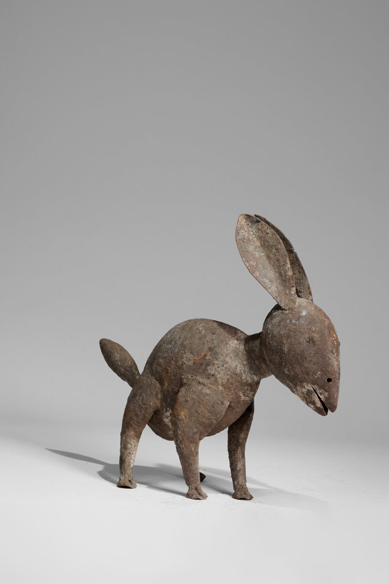 A zoomorphic Dogon bronze sculpture