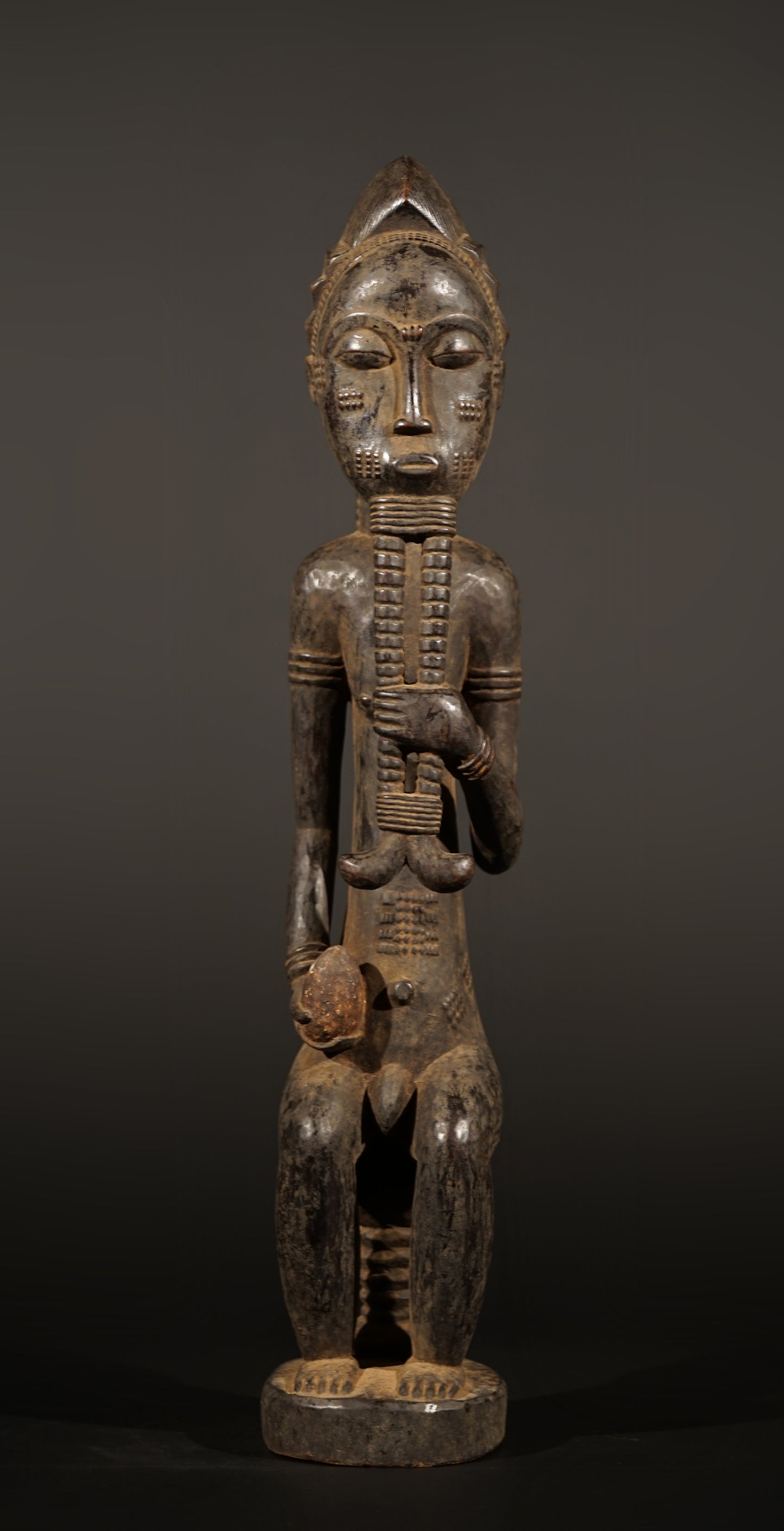 A male Baule sculpture