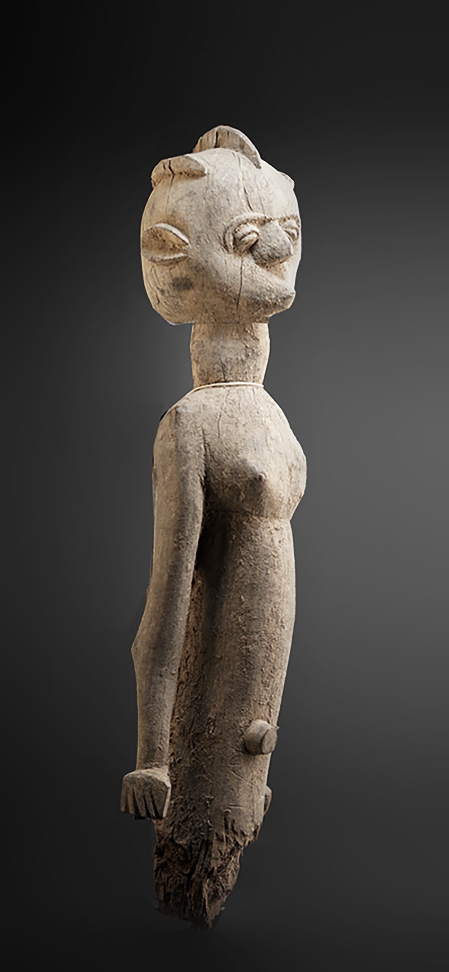 A fragmentary female Lobi sculpture