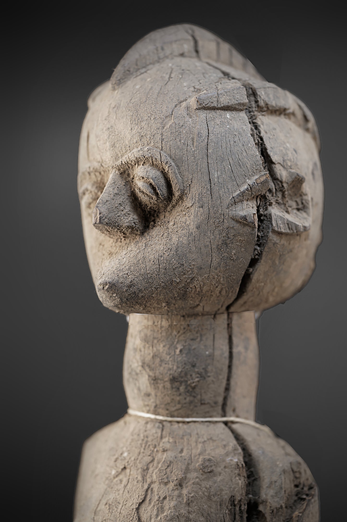 A fragmentary female Lobi sculpture
