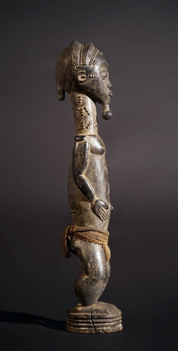 A male Baule sculpture
