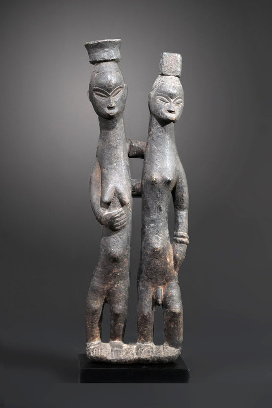 A Guro couple standing on one base