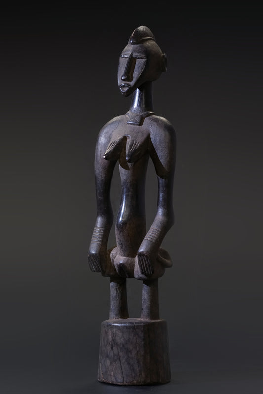 A small female Senufo Rhythm Pounder