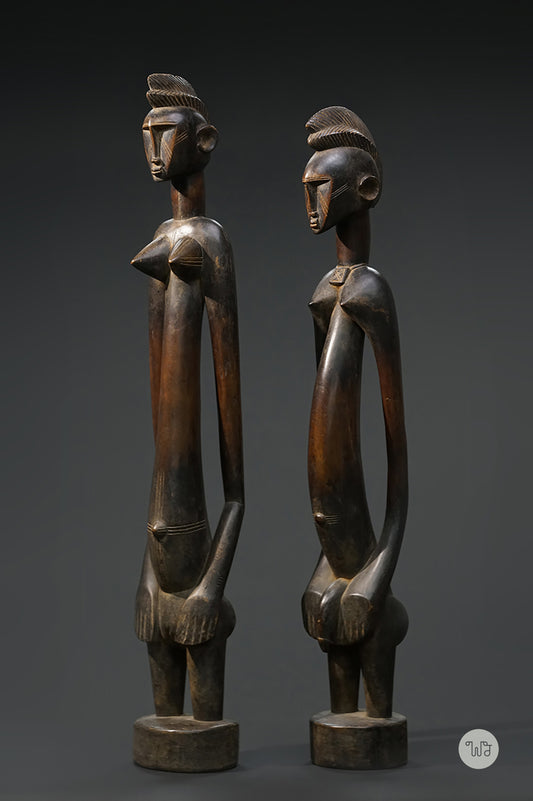 A pair of Senufo rhythm stompers called déblé