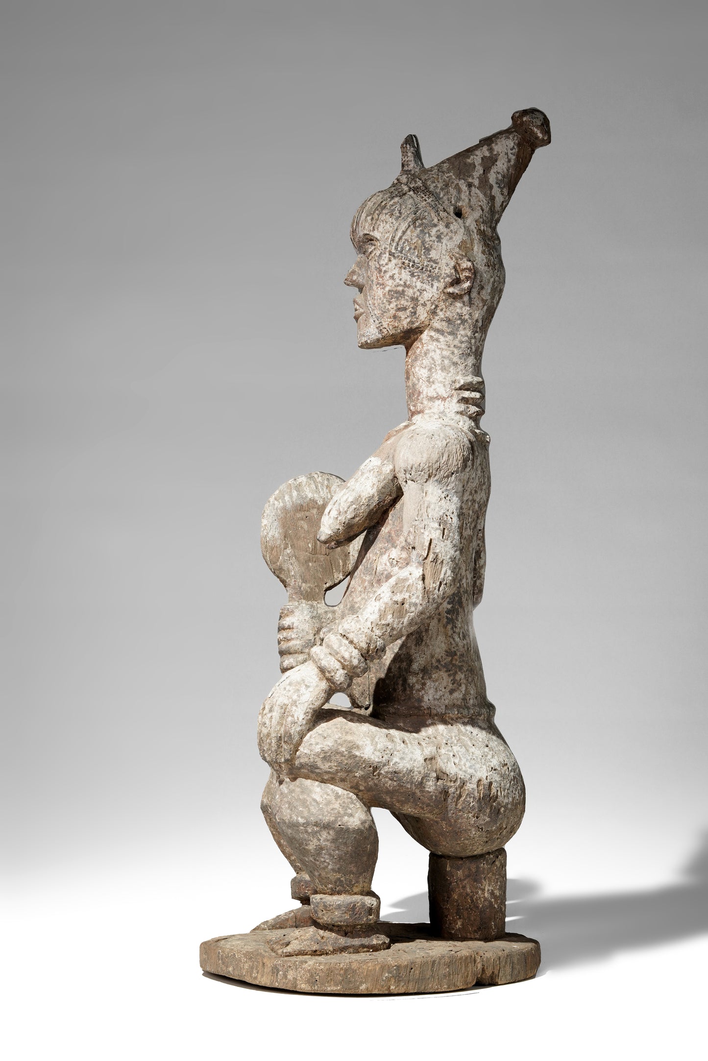 A very expressive female seated Urhobo sculpture
