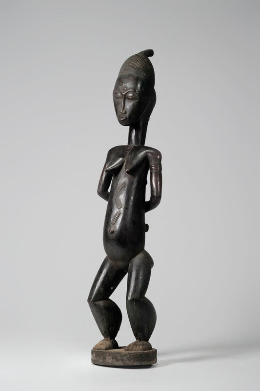 A tall, Baule Maternity