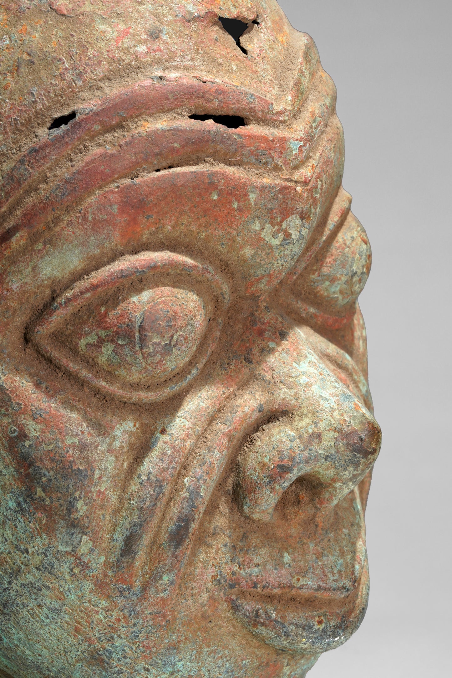 A bronze head in the style of Tada