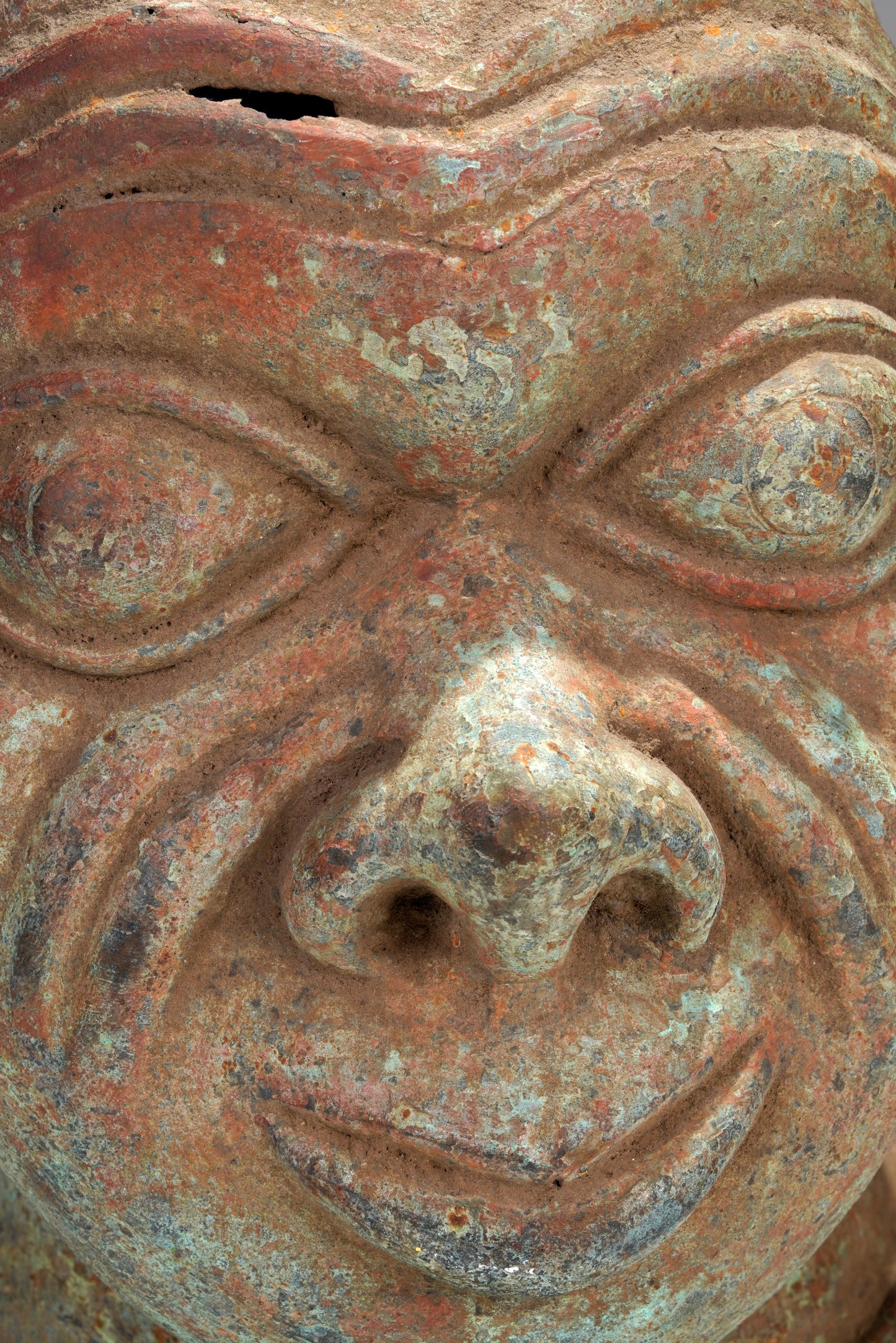 A bronze head in the style of Tada