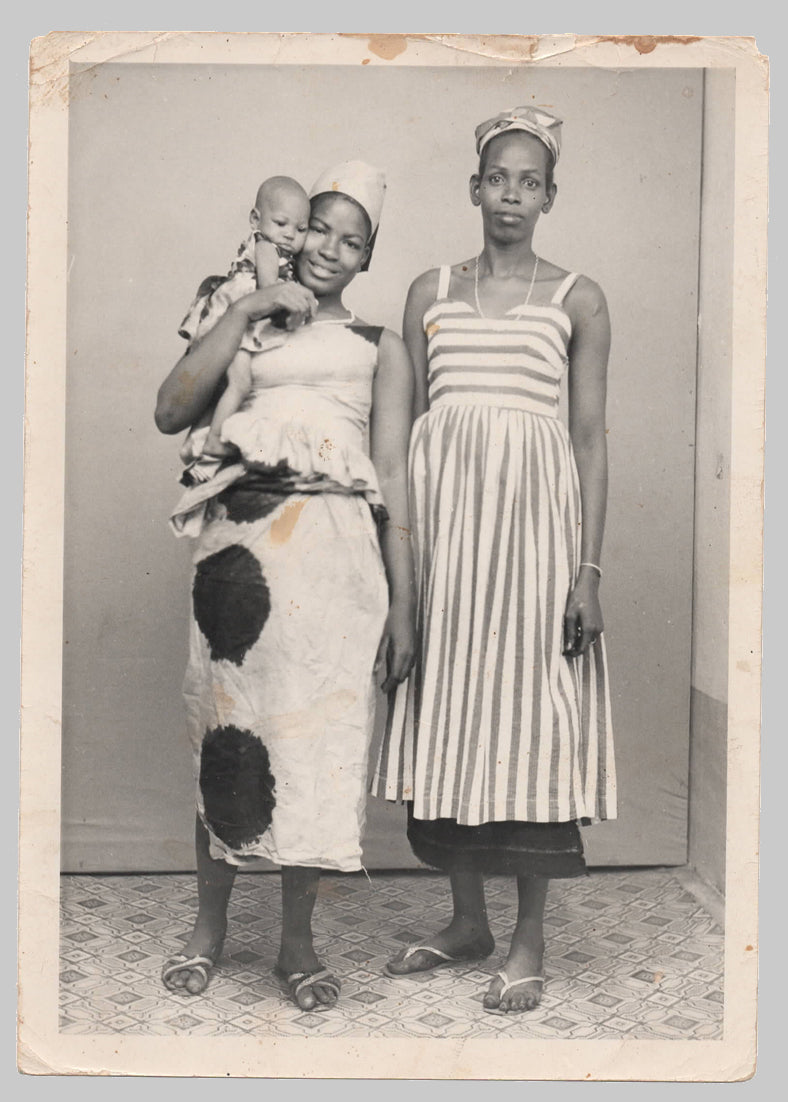 Sixteen original photos by Malick Sidibé and others